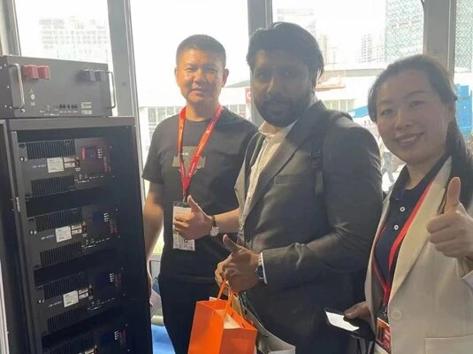 Sunlurio engineering team and partners discussing solar street light project design and configuration