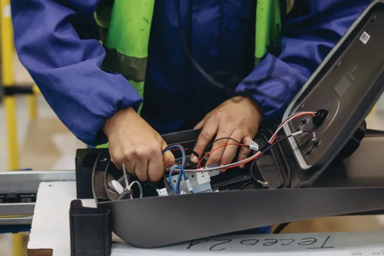 Driver controller and wiring assembly for outdoor lighting manufacturing